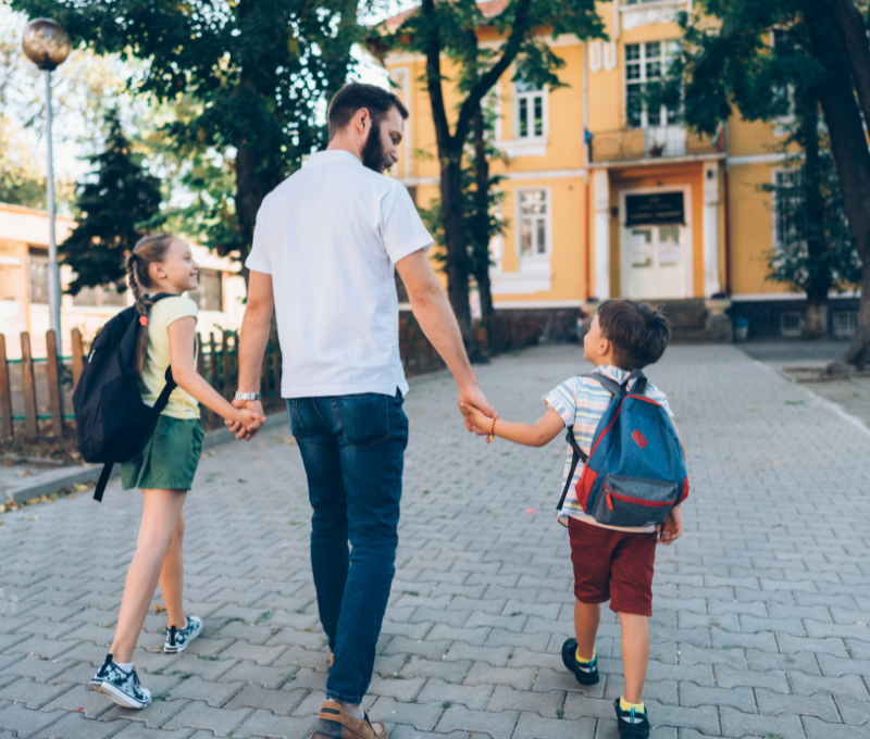 Father walking with children
